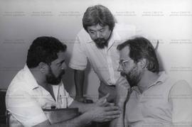 Reunião entre Lula, Luiz Gushiken e José Dirceu (Local desconhecido, Data desconhecida). / Crédito: Autoria desconhecida.